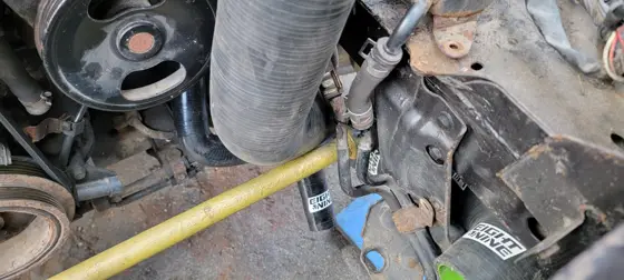 Routing around the front anti-roll bar