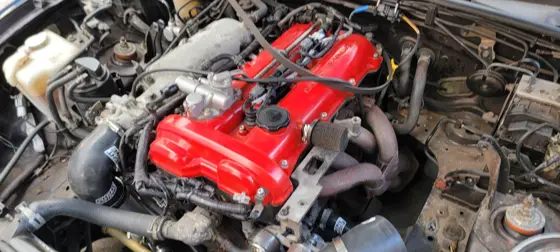 Engine bay during the supercharger installation