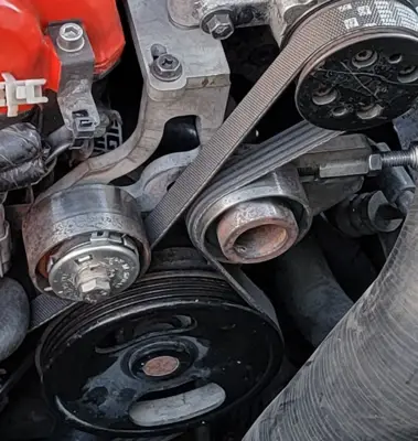 Close-up of the drive belt and tensioners