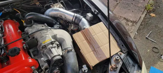 Trial fitting the insulated intake pipe